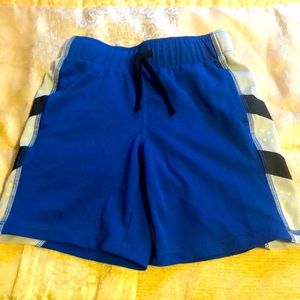 Blue and gray basketball shorts for boys